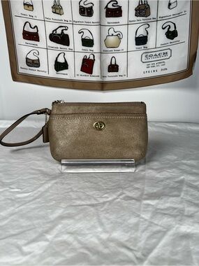 COACH Metallic Gold Polished Pebble Leather Turnlock Wristlet / Clutch